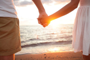 Couple Holding Hands after Finding Out Girlfriend Is Pregnant